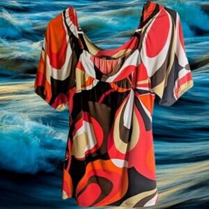 AB Studio medium short sleeve polyester blend stretch orange and brown blouse.